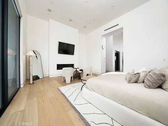 Bedroom, Fireplace, Interior, Recessed Lighting, Wood Texture Flooring
