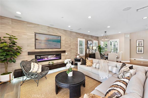 Dining room, Fireplace, Interior, Living room, Pendant Lights, Recessed Lighting, Wood Texture Flooring