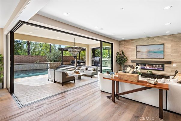 Fireplace, Interior, Living room, Pendant Lights, Recessed Lighting, Wood Texture Flooring, Wooden Walls