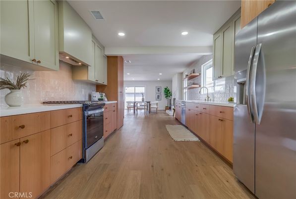 Dining room, Interior, Kitchen, Recessed Lighting, Stainless Steel Appliances, Wood Texture Flooring