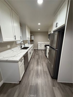 Interior, Kitchen, Recessed Lighting, Stainless Steel Appliances, Wood Texture Flooring