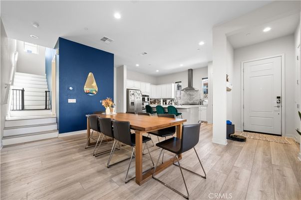 Dining room, Interior, Kitchen, Recessed Lighting, Stainless Steel Appliances, Wood Texture Flooring
