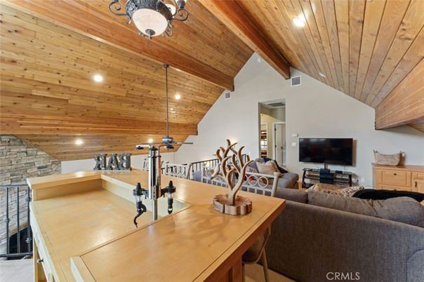 Fitness Equipment, Interior, Living room, Recessed Lighting, Stone Walls, Wooden Beams, Wooden Ceilings