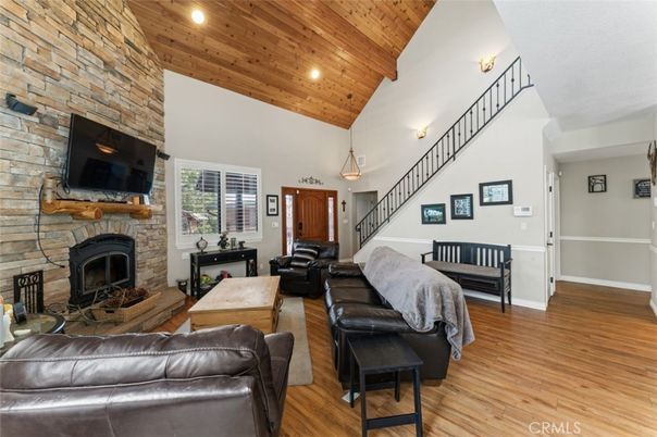 Fireplace, Interior, Living room, Pendant Lights, Piano, Recessed Lighting, Stone Walls, Wooden Ceilings, Wood Texture Flooring
