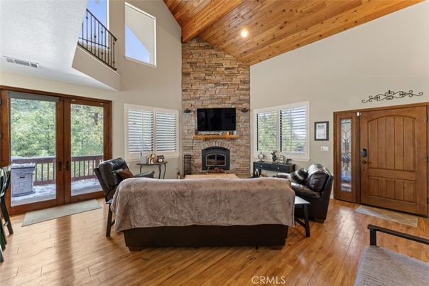 Fireplace, Interior, Living room, Recessed Lighting, Stone Walls, Wooden Ceilings, Wood Texture Flooring