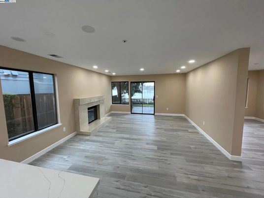 Empty room, Fireplace, Interior, Recessed Lighting, Wood Texture Flooring