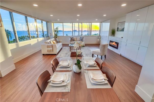 Fireplace, Interior, Living room, Recessed Lighting, Water, Wood Texture Flooring