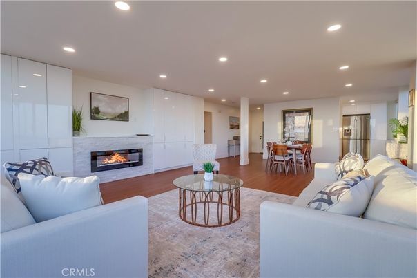 Dining room, Fireplace, Interior, Living room, Recessed Lighting, Wood Texture Flooring