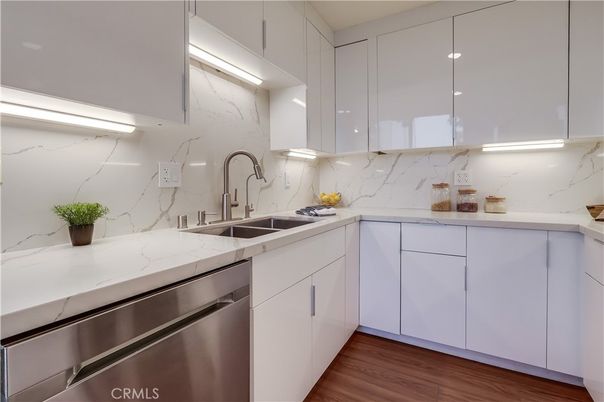 Interior, Kitchen, Marble Walls, Stainless Steel Appliances, Wood Texture Flooring