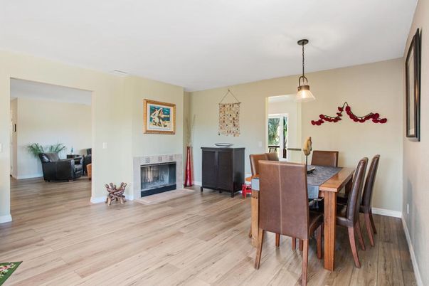 Dining room, Fireplace, Interior, Pendant Lights, Wood Texture Flooring