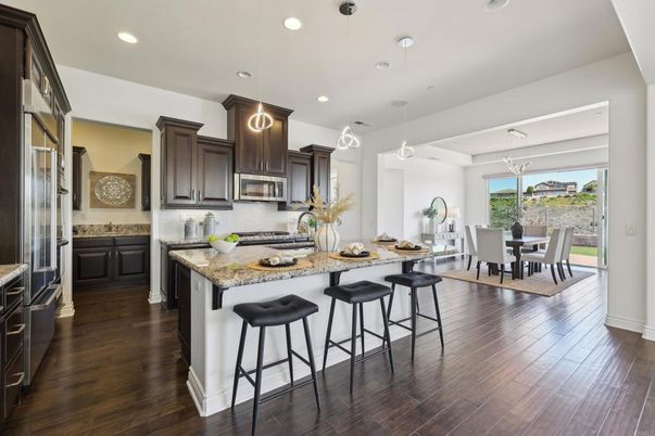 Dining room, Interior, Kitchen, Pendant Lights, Recessed Lighting, Stainless Steel Appliances, Wood Texture Flooring