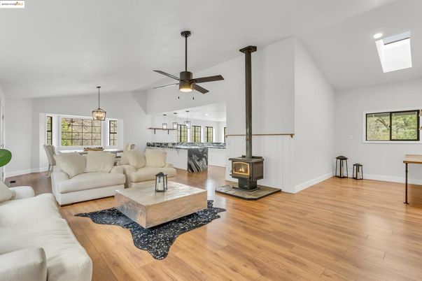 Dining room, Fireplace, Interior, Living room, Pendant Lights, Recessed Lighting, Wood Texture Flooring