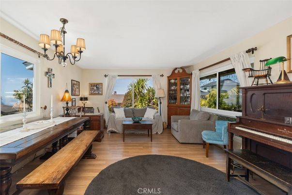 Chandelier, Dining room, Interior, Living room, Piano, Water, Wood Texture Flooring
