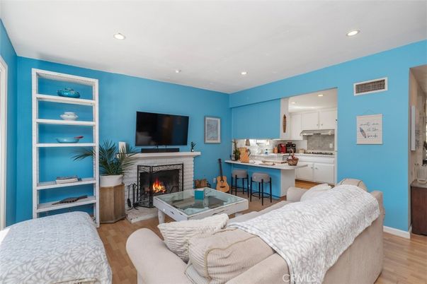 Fireplace, Interior, Kitchen, Living room, Recessed Lighting, Wood Texture Flooring