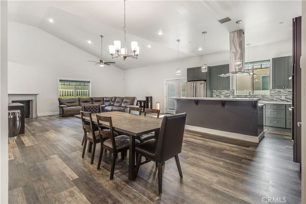 Dining room, Interior, Kitchen, Living room, Pendant Lights, Recessed Lighting, Stainless Steel Appliances, Wood Texture Flooring