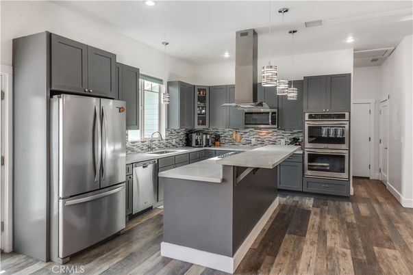 Interior, Kitchen, Pendant Lights, Recessed Lighting, Stainless Steel Appliances, Wood Texture Flooring
