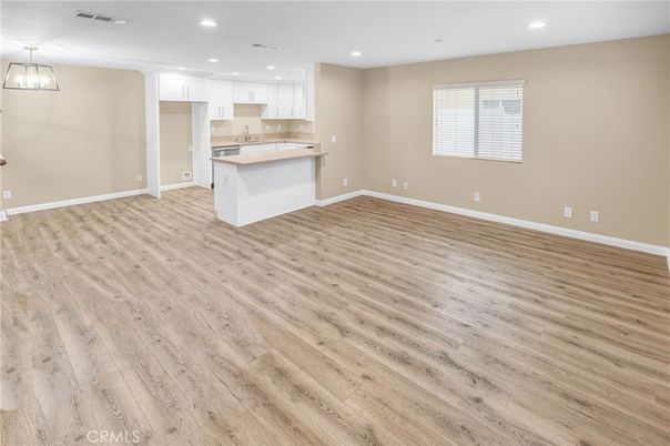 Empty room, Interior, Kitchen, Pendant Lights, Recessed Lighting, Wood Texture Flooring