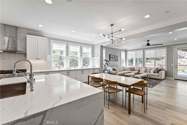 Dining room, Interior, Kitchen, Living room, Pendant Lights, Recessed Lighting, Stainless Steel Appliances, Wood Texture Flooring