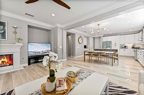 Dining room, Fireplace, Interior, Kitchen, Pendant Lights, Recessed Lighting, Stainless Steel Appliances, Wood Texture Flooring