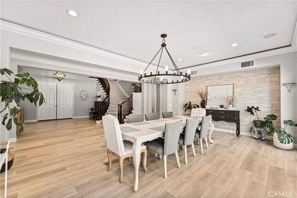 Chandelier, Dining room, Interior, Pendant Lights, Recessed Lighting, Stone Walls, Wood Texture Flooring