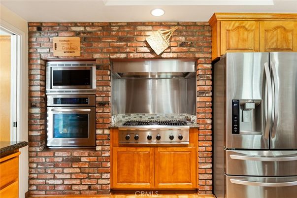Interior, Kitchen, Recessed Lighting, Stainless Steel Appliances, Stone Walls