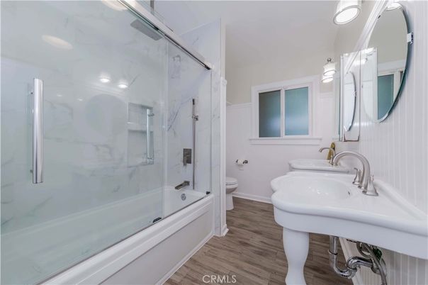 Bathroom, Glass Shower, Interior, Marble Walls, Recessed Lighting, Wood Texture Flooring