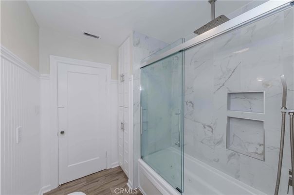 Bathroom, Glass Shower, Interior, Marble Walls, Wood Texture Flooring
