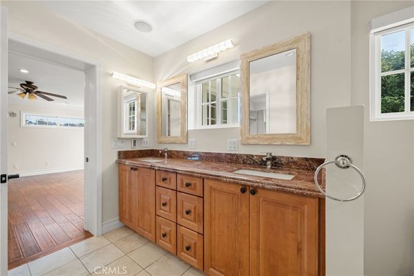 Bathroom, Dual Sink Vanities, Interior, Recessed Lighting, Wood Texture Flooring