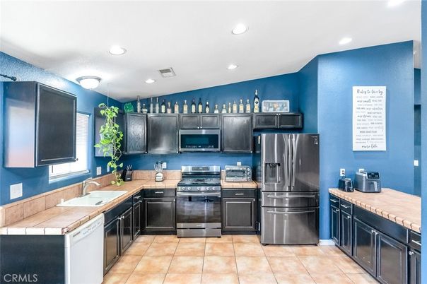 Interior, Kitchen, Recessed Lighting, Stainless Steel Appliances, Tile Countertops