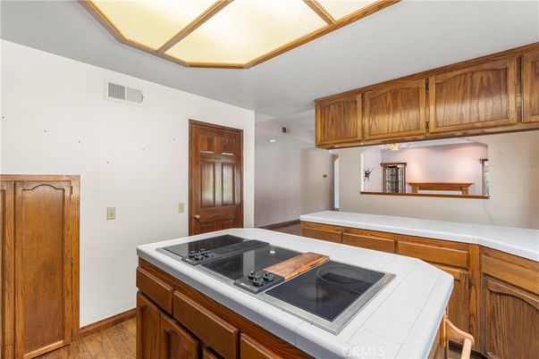Interior, Kitchen, Tile Countertops, Wood Texture Flooring