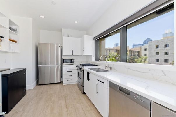 Interior, Kitchen, Recessed Lighting, Stainless Steel Appliances, Wood Texture Flooring