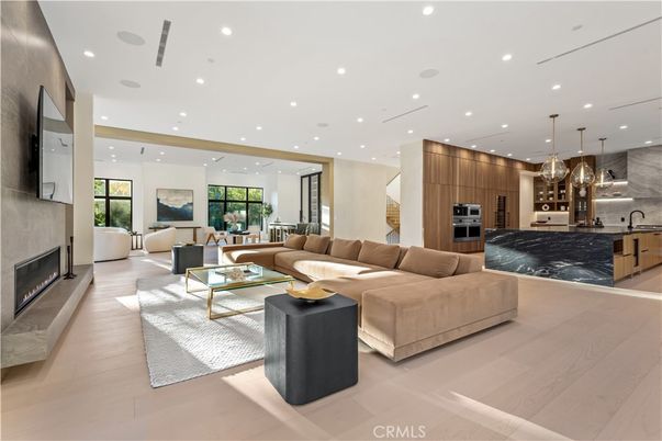 Fireplace, Interior, Kitchen, Living room, Pendant Lights, Recessed Lighting, Stainless Steel Appliances, Wood Texture Flooring
