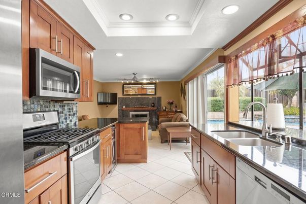 Dining room, Fireplace, Interior, Kitchen, Living room, Recessed Lighting, Stainless Steel Appliances, Stone Walls