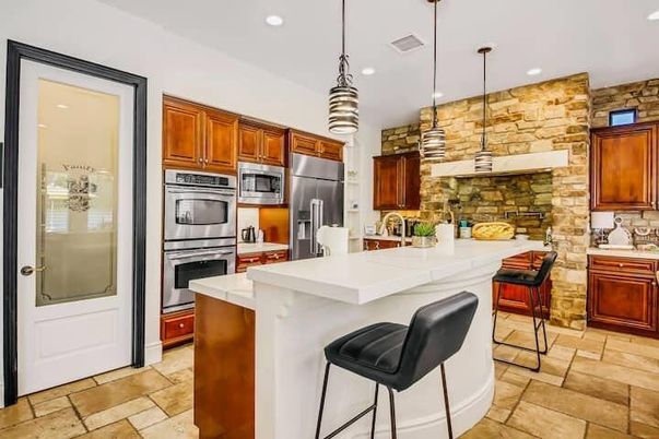 Interior, Kitchen, Pendant Lights, Recessed Lighting, Stainless Steel Appliances, Stone Walls