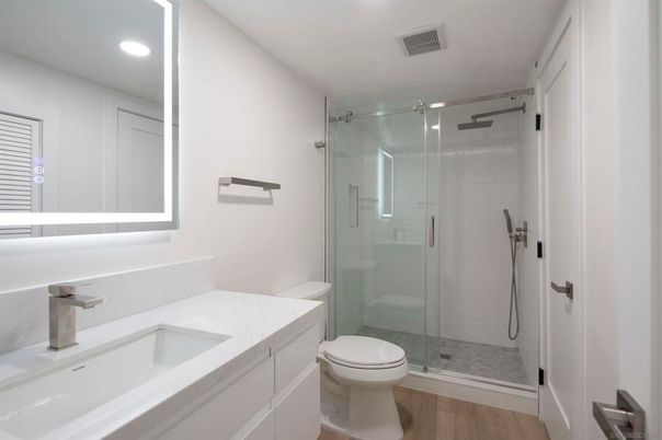 Bathroom, Glass Shower, Interior, Recessed Lighting, Wood Texture Flooring