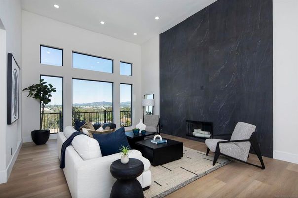 Fireplace, Interior, Living room, Marble Walls, Recessed Lighting, Wood Texture Flooring