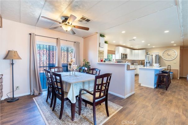 Dining room, Interior, Kitchen, Recessed Lighting, Stainless Steel Appliances, Wood Texture Flooring
