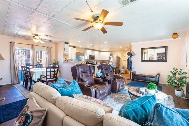 Dining room, Interior, Kitchen, Living room, Recessed Lighting, Stainless Steel Appliances, Wood Texture Flooring