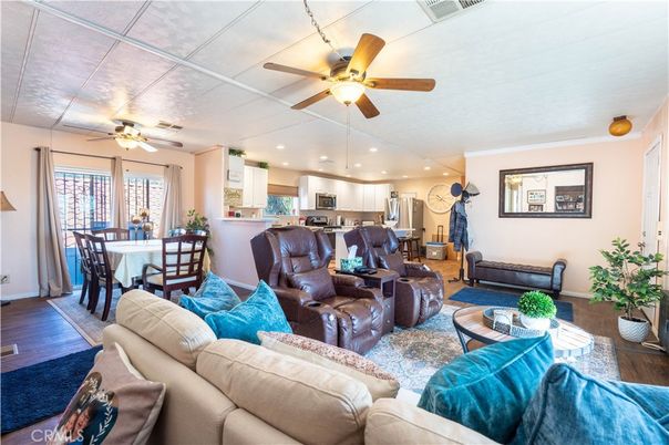Dining room, Interior, Kitchen, Living room, Recessed Lighting, Stainless Steel Appliances, Wood Texture Flooring