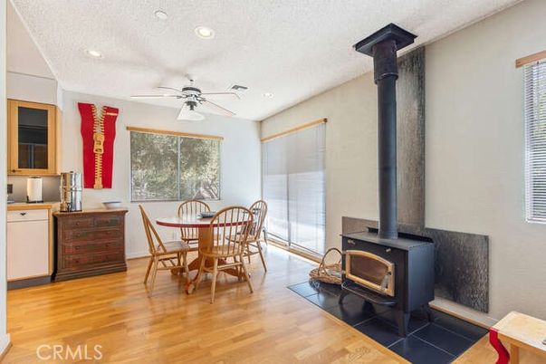 Dining room, Fireplace, Interior, Recessed Lighting, Wood Texture Flooring