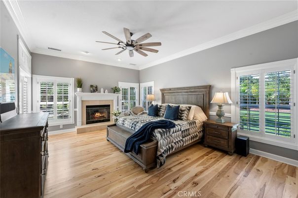 Bedroom, Fireplace, Interior, Recessed Lighting, Wood Texture Flooring