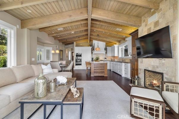 Dining room, Fireplace, Interior, Kitchen, Living room, Pendant Lights, Recessed Lighting, Stainless Steel Appliances, Stone Walls, Wooden Beams, Wooden Ceilings, Wood Texture Flooring