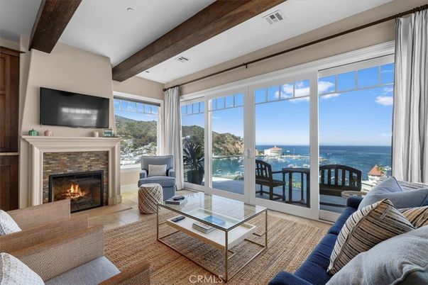 Fireplace, Interior, Living room, Recessed Lighting, Water, Wooden Beams