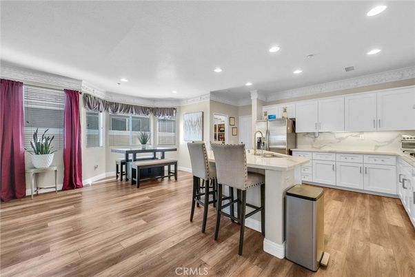 Dining room, Interior, Kitchen, Marble Walls, Recessed Lighting, Stainless Steel Appliances, Wood Texture Flooring