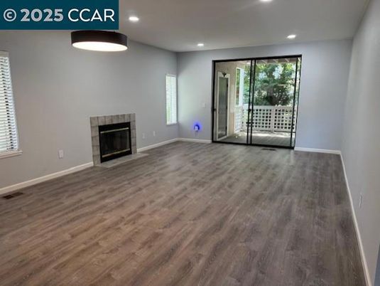 Empty room, Fireplace, Interior, Recessed Lighting, Wood Texture Flooring