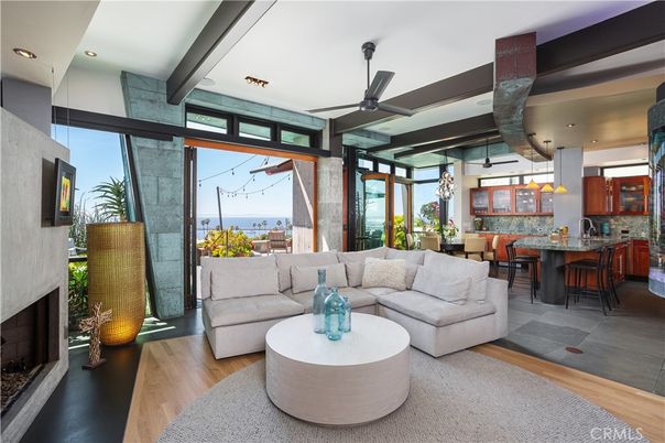 Dining room, Fireplace, Interior, Living room, Pendant Lights, Recessed Lighting, Water, Wood Texture Flooring