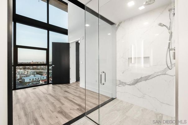 Bathroom, Glass Shower, Interior, Marble Walls, Recessed Lighting, Water, Wood Texture Flooring