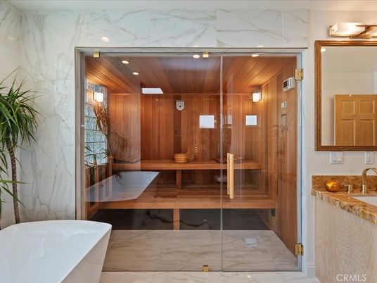 Bathroom, Free Standing Baths, Glass Shower, Interior, Marble, Marble Walls, Recessed Lighting, Sauna Room