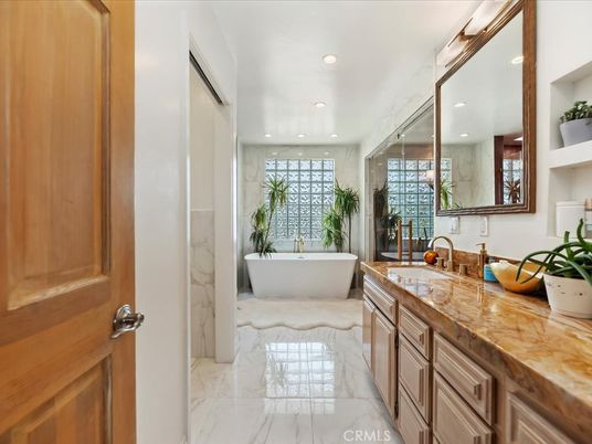 Bathroom, Dual Sink Vanities, Free Standing Baths, Interior, Marble, Marble Walls, Recessed Lighting