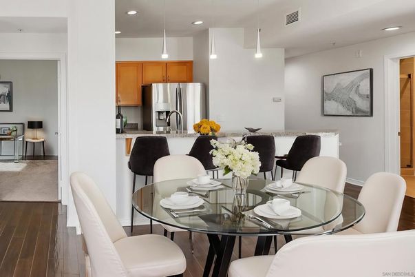 Dining room, Interior, Kitchen, Pendant Lights, Recessed Lighting, Stainless Steel Appliances, Wood Texture Flooring